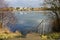 Beautiful Biesdorfer Baggersee lake surrounded by winter vegetation in January. Berlin, Germany