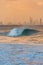 Beautiful big wave with iconic Gold Coast skyscrapers on the background