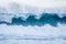 Beautiful and bigs blue and green waves breaking - pacific or athlantic ocean - blue sea and great place to surf