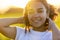 Beautiful Biracial Mixed Race African American Girl Smiling at Sunset