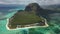 Beautiful bird`s-eye view of mount Le Morne Brabant and the waves of the Indian ocean in Mauritius.Underwater waterfall near mount