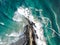 Beautiful Bird`s eye View of waves, cliffs and turquoise ocean in Byron Bay, Australias most eastern Point.