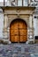 Beautiful bivalve wooden massive door in the old historic house