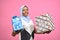 beautiful black girl holding gift boxes and presents smiling and feeling excited