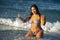 Beautiful black hair girl mexican latina portrait on baja california beach