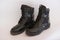 Beautiful black leather boots for hard-line soldiers, on a white background