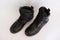 Beautiful black leather boots for hard-line soldiers, on a white background
