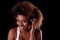 Beautiful black woman happy listening music