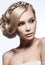 Beautiful blond girl in the image of a bride with a tiara in her hair. Beauty face. Wedding image.
