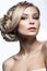 Beautiful blond girl in the image of a bride with a tiara in her hair. Beauty face. Wedding image.