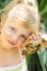 Beautiful blond girl with turtle