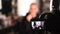 Beautiful blond hair blogger applies lipstick. Woman making a video for her blog