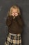 Beautiful blond schoolgirl crying sad moody and tired in front of school class blackboard