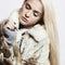 Beautiful blond woman Girl in Mink Fur Coat.winter fashion