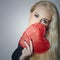 Beautiful Blond Woman with Red Heart. Beauty Girl. Show Love Symbol. Valentines Day