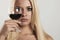 Beautiful blond woman with red wine.make-up.red lips.wineglass.drink