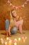 Beautiful blond woman sitting on the floor portrait, sweet home