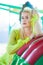 Beautiful blonde elegant fashion woman portrait in amusement park summer