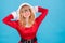 Beautiful blonde santa claus woman isolated