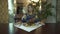 Beautiful blonde tattooed young woman girl waiting to eat huge piece of fried meat with hands in fancy restaurant