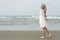 Beautiful blonde teenage girl on beach