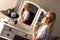 Beautiful Blonde Woman Brushing Hair Bedroom Vanity Natural Beauty