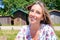 Beautiful blonde woman front of fisherman wooden hut in Arcachon bay France