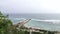 Beautiful blue beach panoramic ocean view, with clean water. View from the cliff. Tropical Bali island, Indonesia.