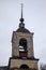 Beautiful blue clock tower. Tower of the old church.