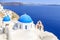 Beautiful Blue domed chuch in Oia village, Santorini island