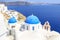 Beautiful Blue domed chuch in Oia village, Santorini island