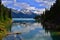 Beautiful blue Garibaldi Lake surrounded by high mountains with glaciers.