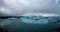 Beautiful blue icebergs float over water at Jokulsarlon glacier lagoon Iceland