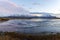 Beautiful blue lake near snow mountains in Hofn, Iceland. Iceland winter season landscape background.