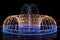 Beautiful blue lights in New Year holidays in night. Bright fountain in darkness