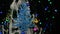 Beautiful blue New Year and Christmas decorations in the shape of a Christmas tree swinging on a rope