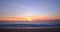 Beautiful blue / orange gradient sky at sunset on the beach