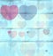 Beautiful blue and red transparent hearts on baby pastel blue bent paper