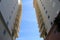 Beautiful blue skies devoid of clouds are backdrop for contemporary architecture of condo buildings