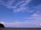 Beautiful blue skies with pattern clouds above the ocean.