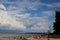 Beautiful blue skies with pattern clouds above ocean with people relaxing.