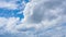 Beautiful blue sky background TimeLapse with fluffy white cirrus or cirrostratus cloud cloudscape slowly moved on daytime sky hori