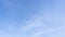 Beautiful blue sky background TimeLapse with wipe white stratus cloud cloudscape slowly moved on daytime sky horizon in tropica