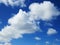 Beautiful blue sky and Caribbean white cloud background. Cottony textured clouds in tropical sky. Summer sky with cumulus clouds