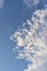 Beautiful blue sky with cirrus clouds. Bright positive background