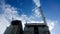 Beautiful blue sky with cloud over smokestack