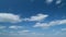 Beautiful blue sky with stratocumulus clouds background. Blue sky background with tiny cumulus clouds. Timelapse.