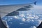 Beautiful blue sky view from an airplane, dramatic clouds.