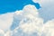 Beautiful blue sky and white cumulus clouds abstract background. Cloudscape background.  Blue sky and fluffy white clouds on sunny