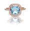 Beautiful Blue Topaz and diamond Rose Gold Halo Ring